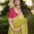 green green saree with contrasting pink blouse