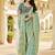 green elegant sea green saree with golden weaving