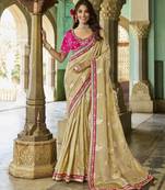 ivory ivory saree with pink embroidery