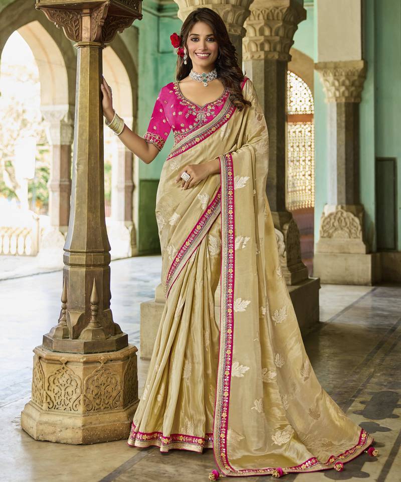 ivory ivory saree with pink embroidery
