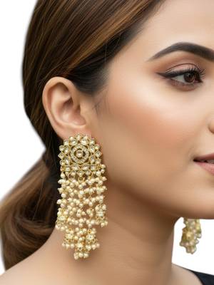 Light gold plated  kundan tassel earrings 5