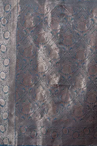 teal blue color woven banarasi art silk blend saree with blouse