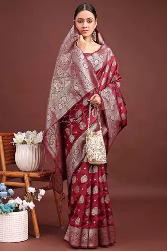 maroon color woven banarasi art silk blend saree with blouse