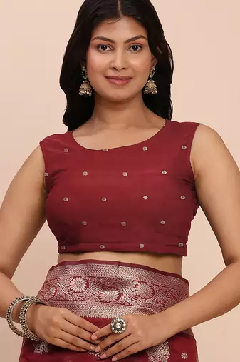 maroon color woven banarasi art silk blend saree with blouse