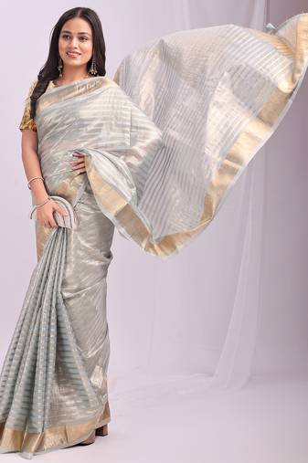 Grey color zari lining border orgenz saree with blouse