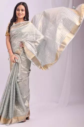 Grey color zari lining border orgenz saree with blouse