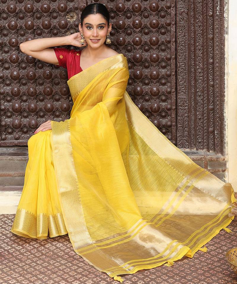 yellow color cotton plain zari border saree with blouse
