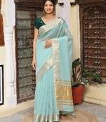 sky_blue color cotton plain zari border saree with blouse