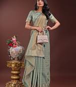 light green color orgenza zari border saree with blouse