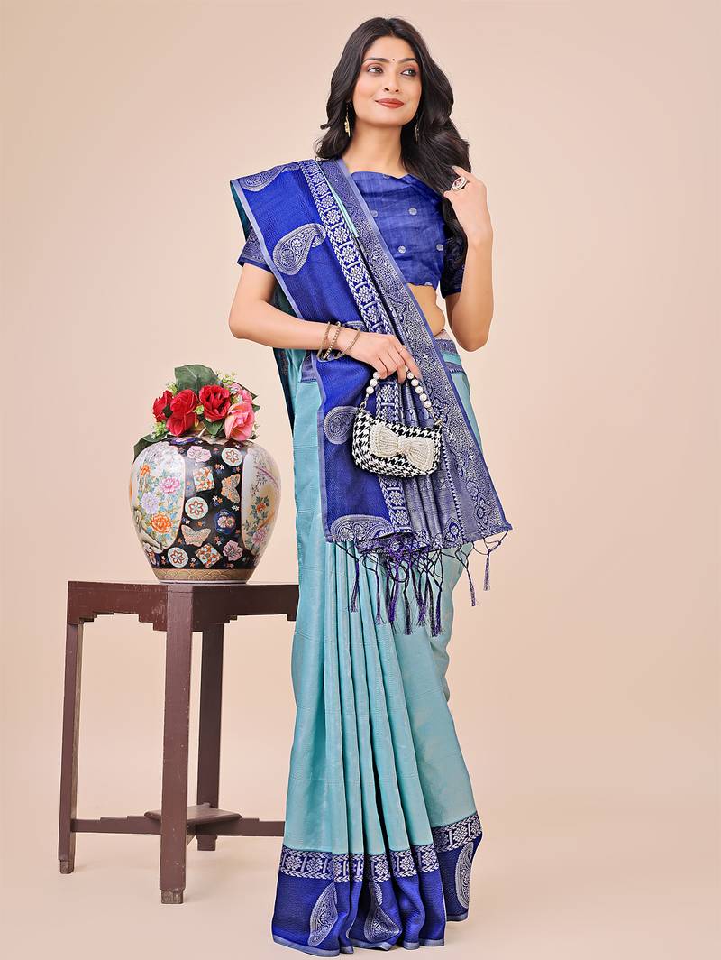 teal color woven lichi art silk blend saree with blouse
