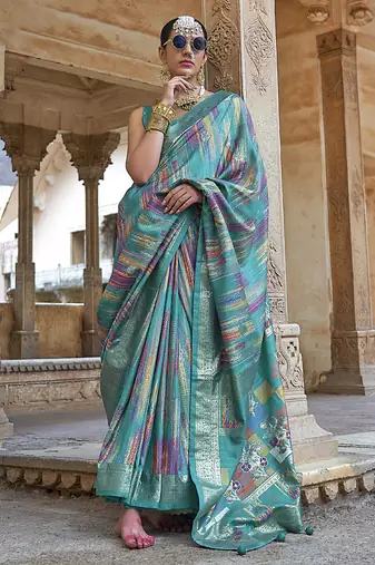 teal green soft silk blend woven patola printed saree