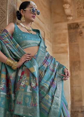 teal green soft silk blend woven patola printed saree 2