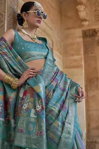 teal green soft silk blend woven patola printed saree