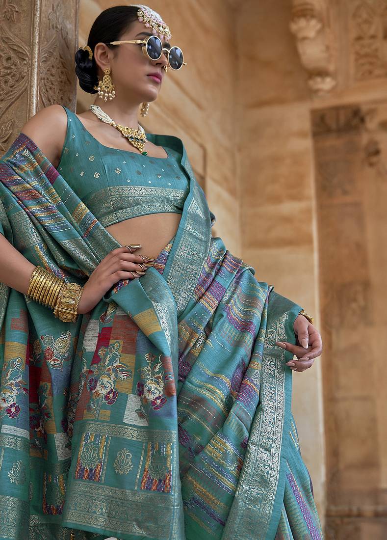 teal green soft silk blend woven patola printed saree