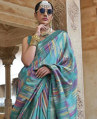 teal green soft silk blend woven patola printed saree 3