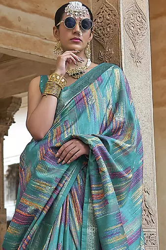 teal green soft silk blend woven patola printed saree