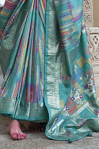 teal green soft silk blend woven patola printed saree