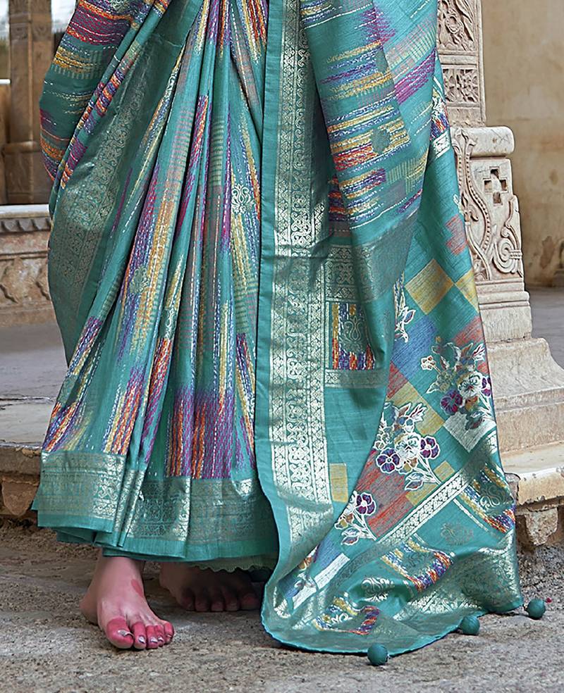 teal green soft silk blend woven patola printed saree