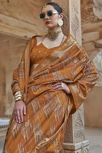 mustard yellow soft silk blend woven patola printed saree