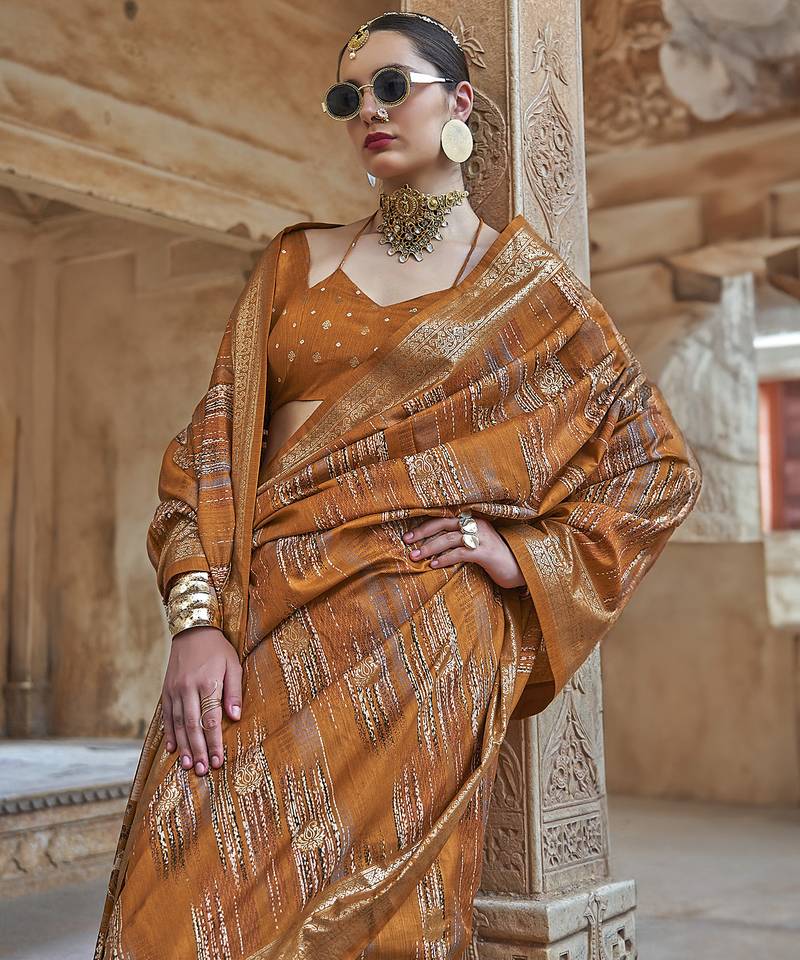 mustard yellow soft silk blend woven patola printed saree