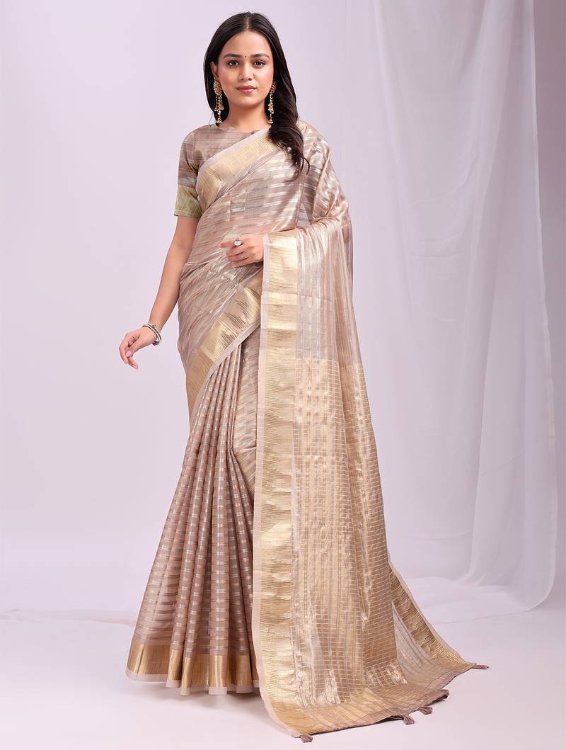 Beige color zari lining border orgenz saree with blouse