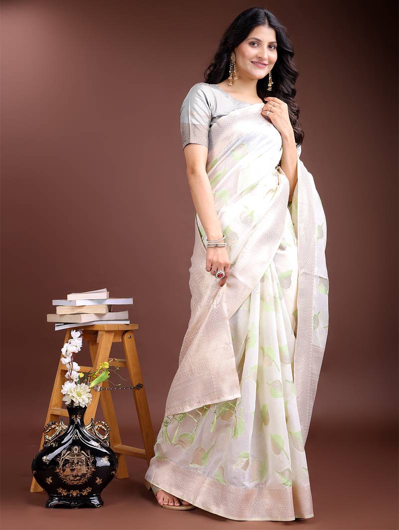 white & light green color cotton zari woven saree with blouse