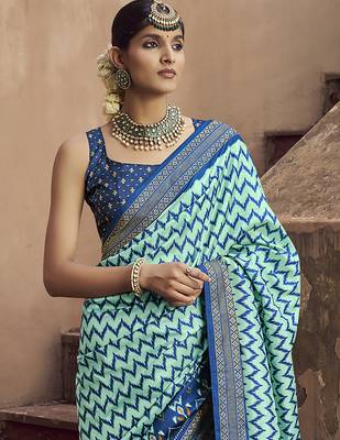 turquoise soft silk blend ikkat printed patola saree 3