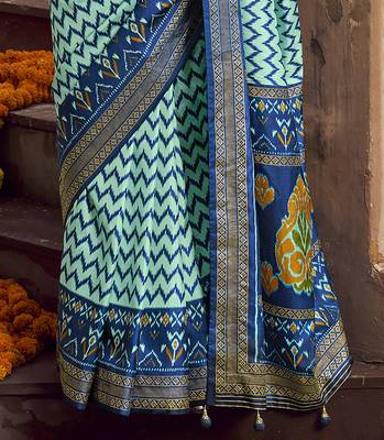 turquoise soft silk blend ikkat printed patola saree 4