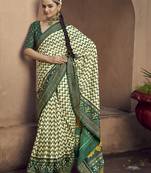cream soft silk blend ikkat printed patola saree