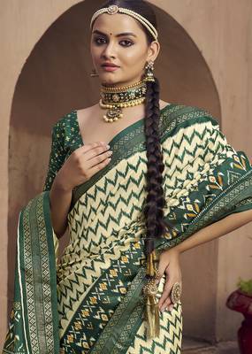 cream soft silk blend ikkat printed patola saree 2