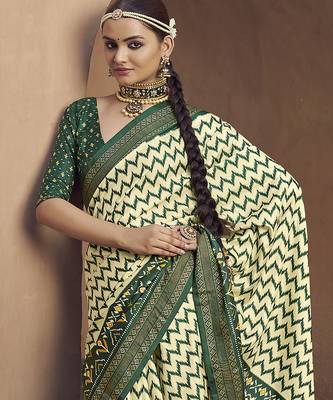 cream soft silk blend ikkat printed patola saree 3