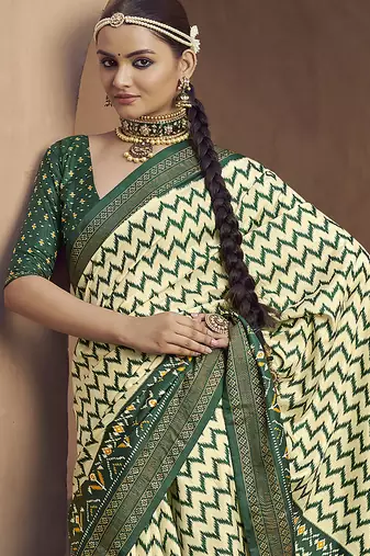 cream soft silk blend ikkat printed patola saree