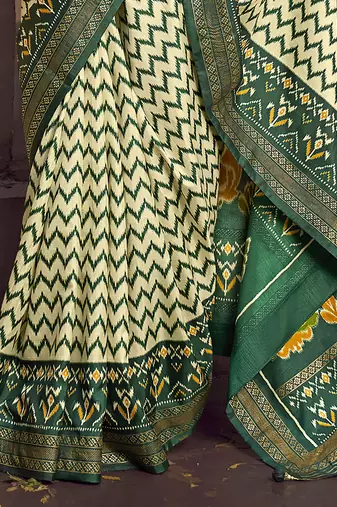 cream soft silk blend ikkat printed patola saree