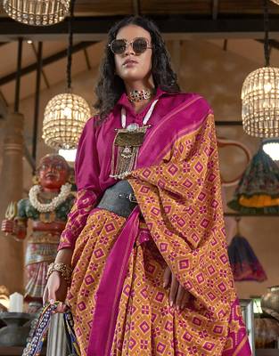 orange soft silk blend ikkat printed patola saree 3
