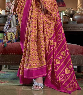 orange soft silk blend ikkat printed patola saree 4