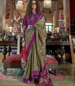 vibrant green soft silk blend ikkat printed patola saree