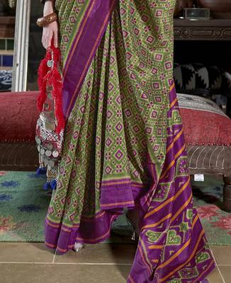 vibrant green soft silk blend ikkat printed patola saree 4