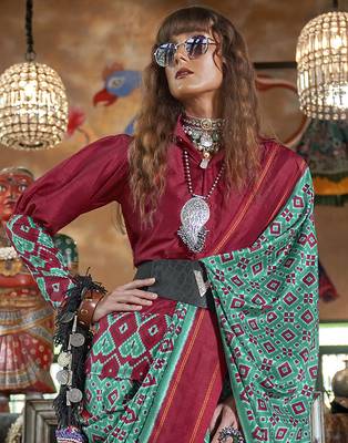 teal soft silk blend ikkat printed patola saree 3