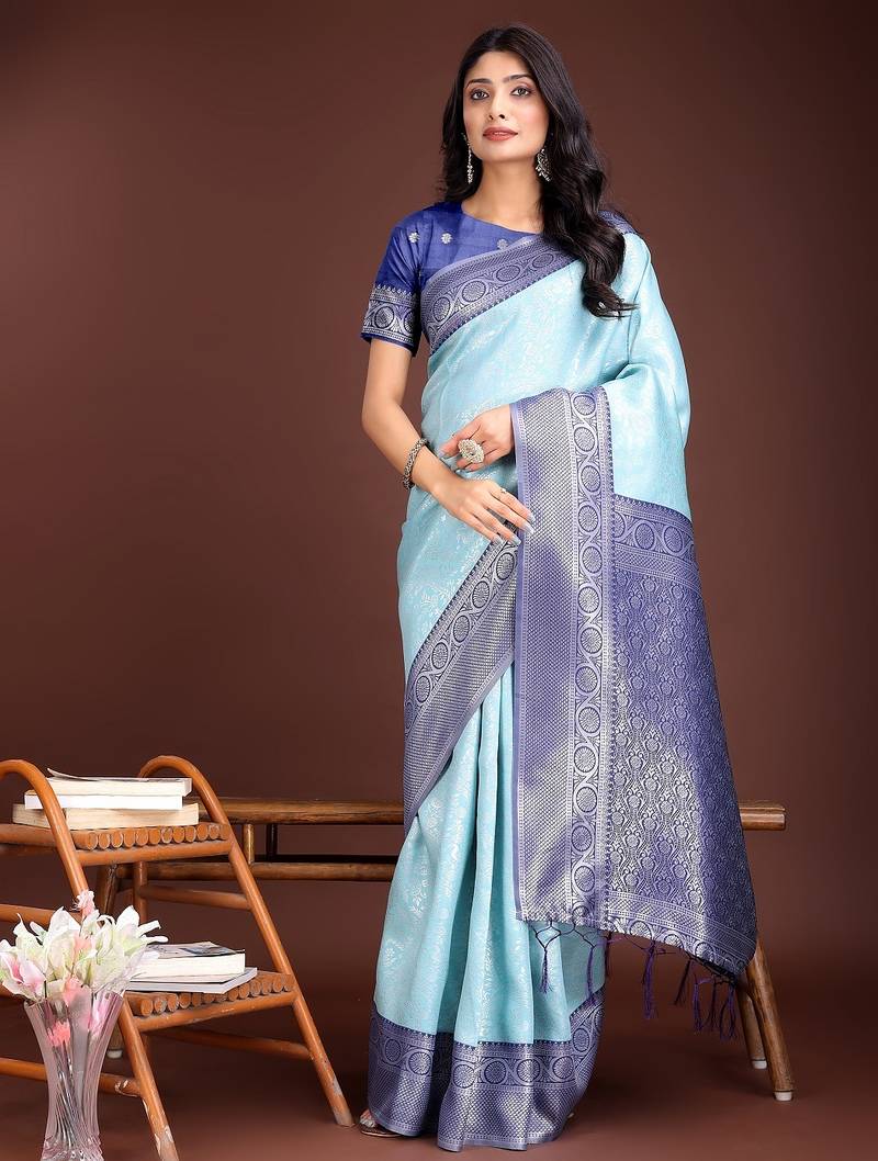 teal color lichi art silk blend zari weaving saree with blouse