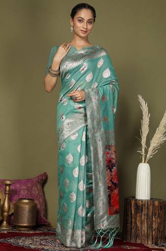rama green color linen cotton woven work flower pallu saree 