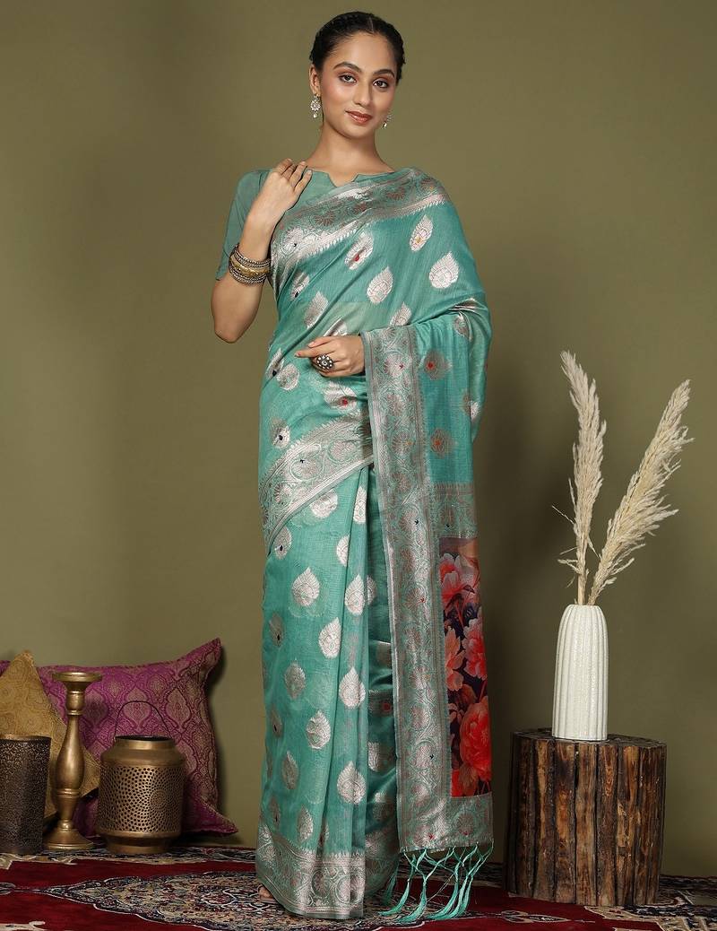 rama green color linen cotton woven work flower pallu saree 