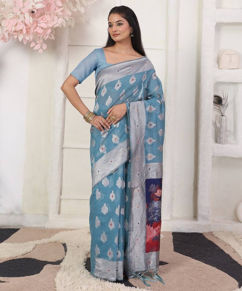 sky blue color woven linen cotton flower & peacock pallu saree