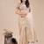 light Beige color woven orgenza saree with blouse