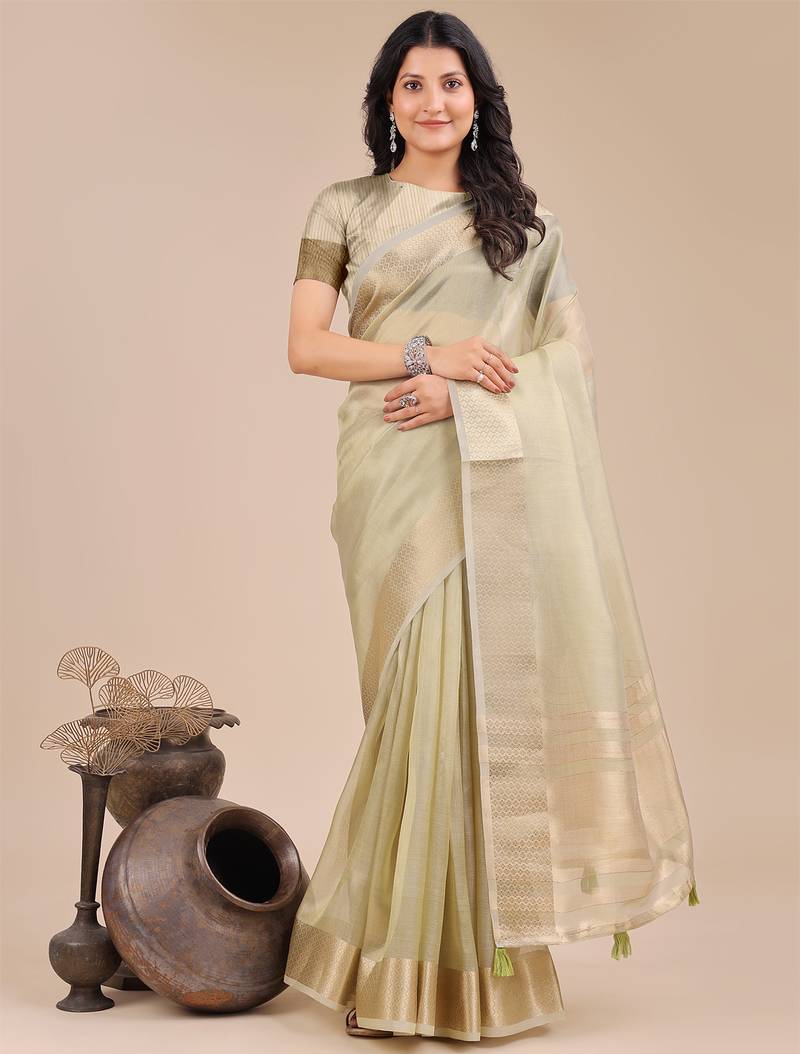 light green color woven orgenza saree with blouse