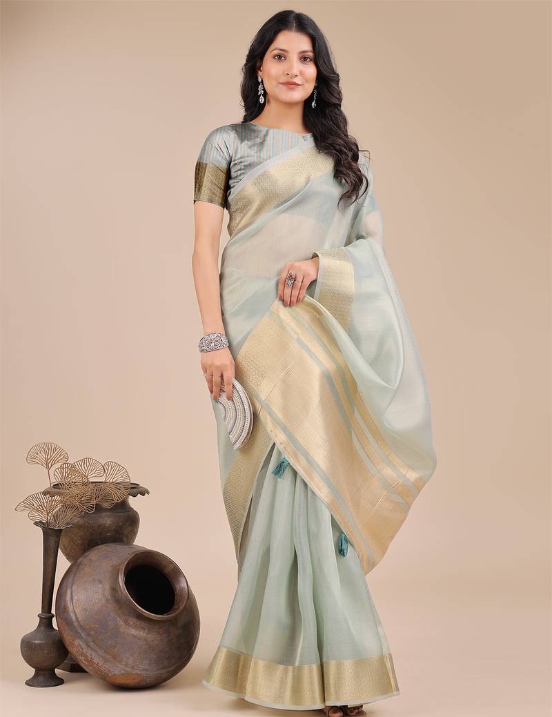 sea green color woven orgenza saree with blouse