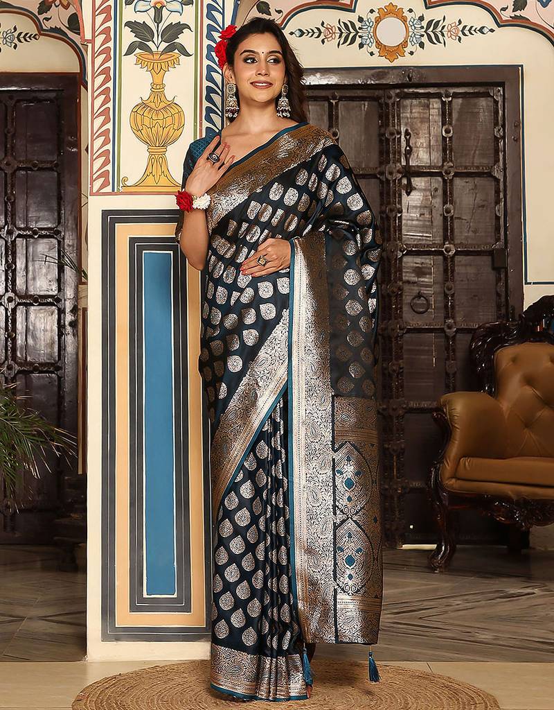 teal color zari woven silk blend saree with un-stitch blouse