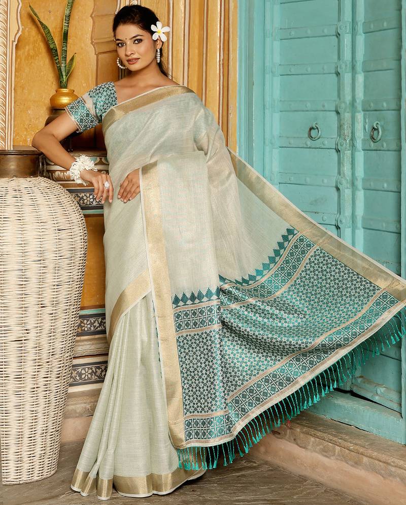 Off White color woven border & pallu linen saree