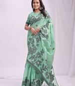 rama green color embroidred linen cotton saree
