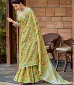 yellow green color embroidered & zari border linen saree with blouse