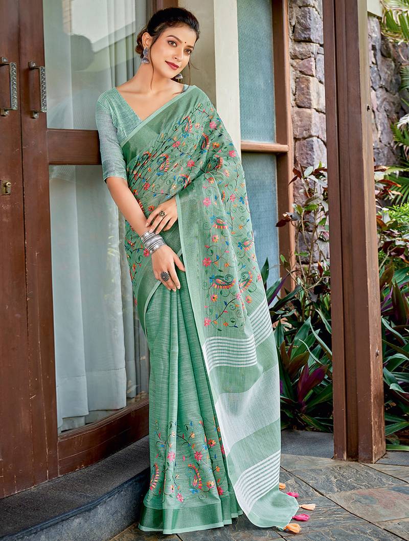 sea green color embroidered & zari border linen saree with blouse